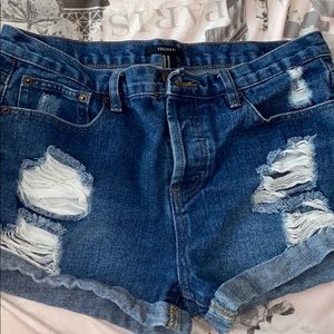 Distressed blue denim shorts